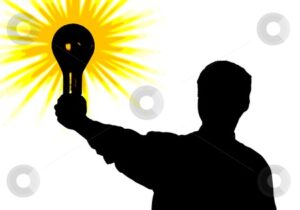 Silhouette of man with bulb - idea in hand. illustration